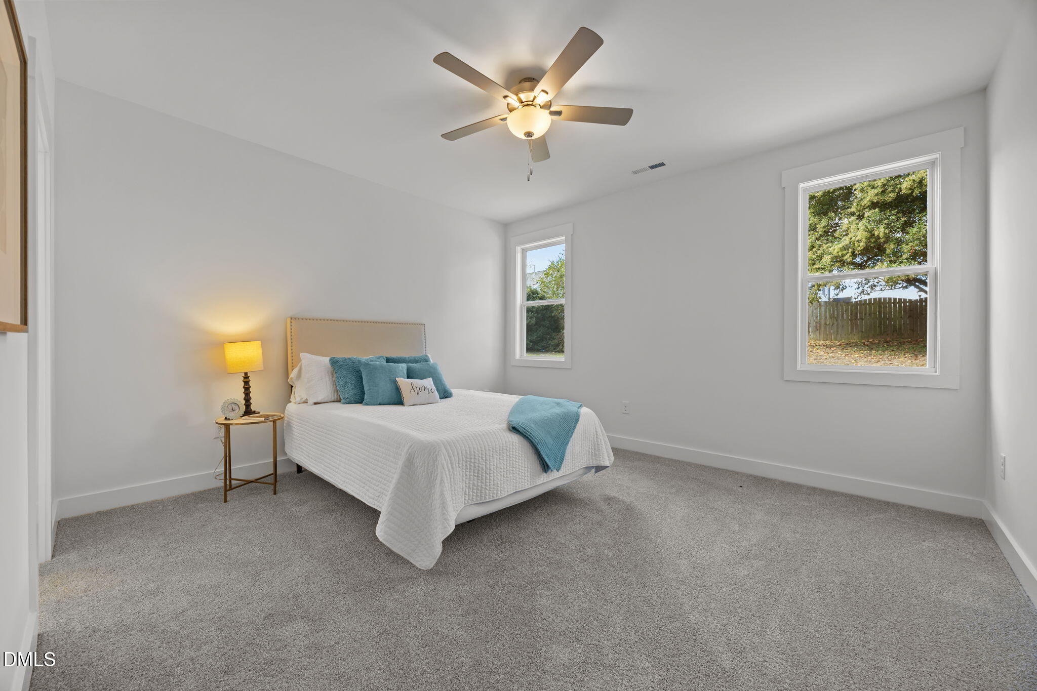 144 Howard Harris Road Franklinton, NC 27525 - Photo 9 of 21 a spacious bedroom with a bed and a window