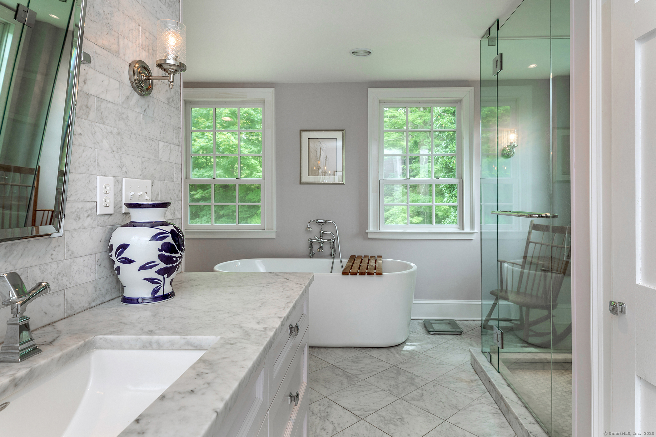 119 Knibloe Hill Road Sharon, CT 06069 - Photo 18 of 30 a kitchen with a sink a window and chairs