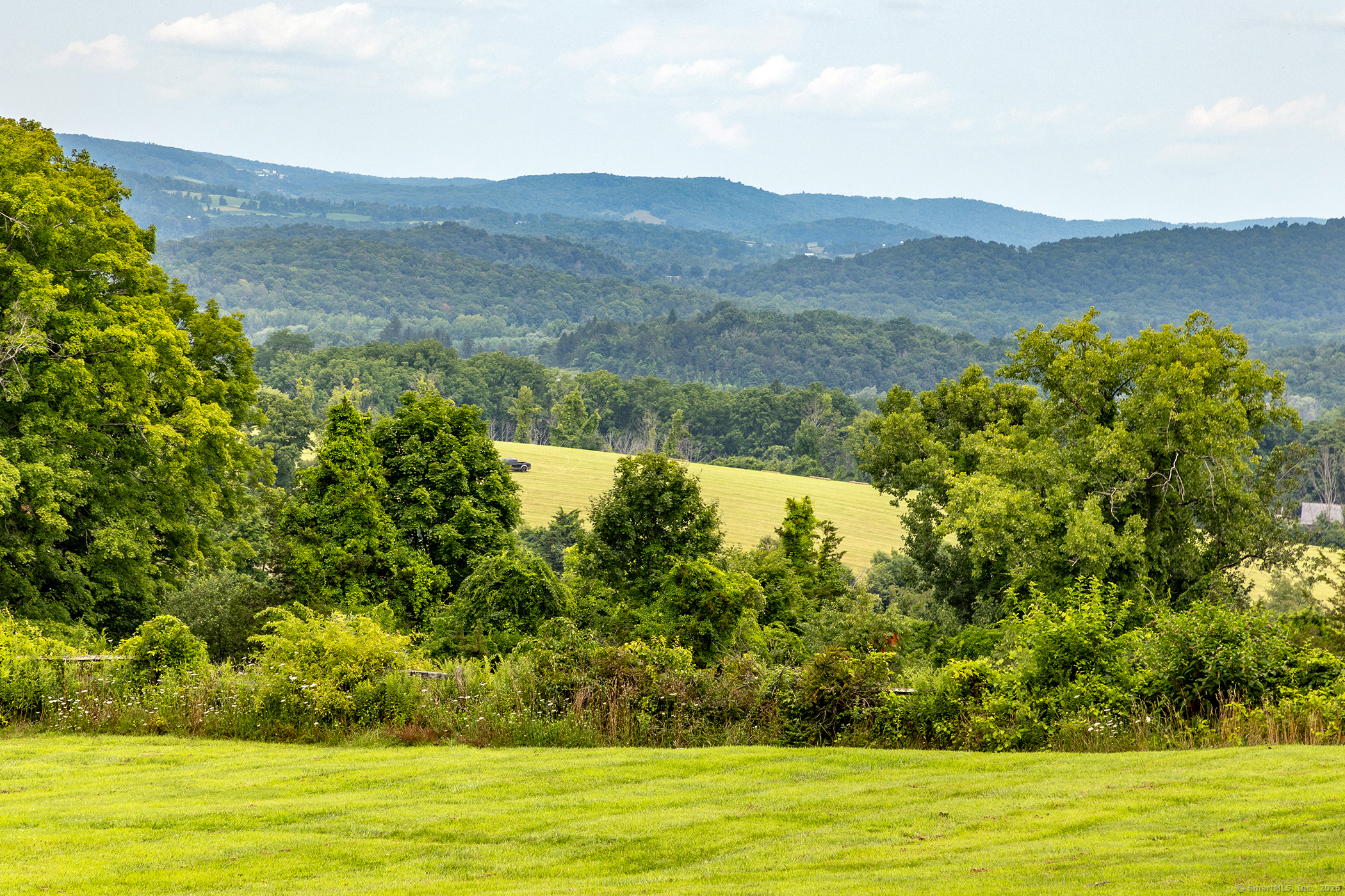 119 Knibloe Hill Road Sharon, CT 06069 - Photo 3 of 30 a view of lake with mountain