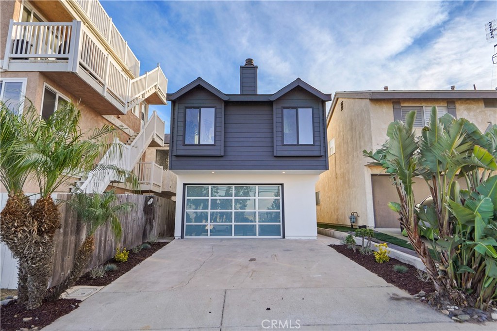 380 Rossmore Drive Oxnard, CA 93035 - Photo 1 of 1 a front view of a house with a garden