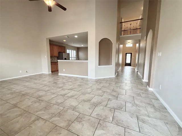 a view of empty room with windows