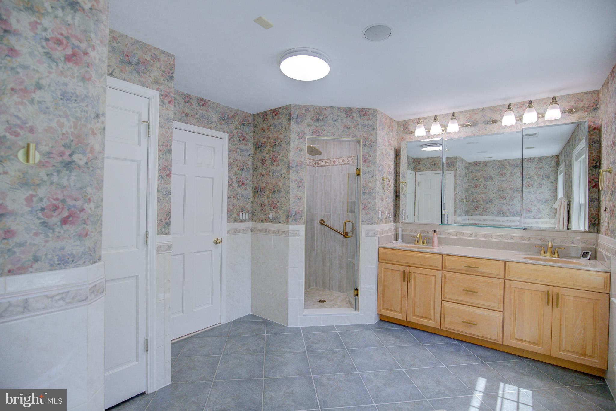 813 Blacks Hill Road Great Falls, VA 22066 - Photo 47 of 92 Custom Primary Ensuite Bath w/ Frameless Shower