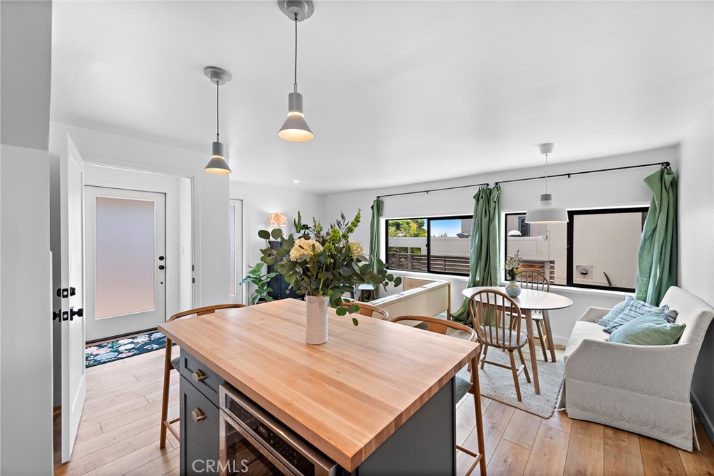 450 Ruby Street, Unit LOWR Laguna Beach, CA 92651 - Photo 6 of 22 a view of a dining room with furniture and window