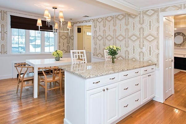 17 Hagen Road Newton, MA 02459 - Photo 4 of 10 a kitchen with granite countertop white cabinets and window