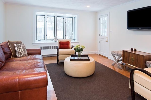 17 Hagen Road Newton, MA 02459 - Photo 6 of 10 a bedroom with furniture and a flat screen tv