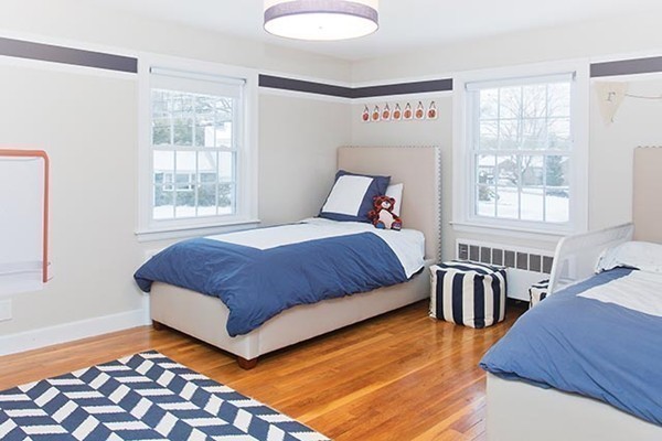 17 Hagen Road Newton, MA 02459 - Photo 8 of 10 a bedroom with a bed and wooden floor