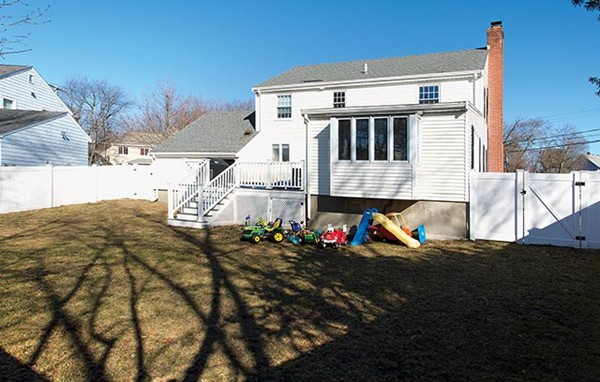 17 Hagen Road Newton, MA 02459 - Photo 10 of 10 a view of the house with backyard and sitting area