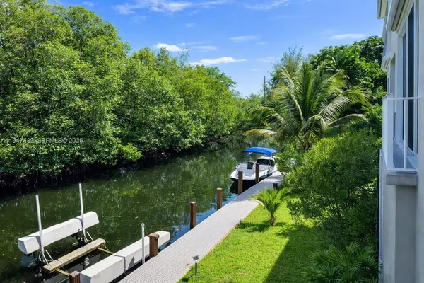 a view of a garden with a lake view