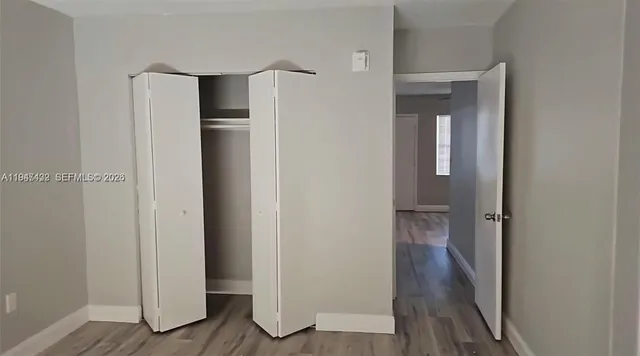 a bathroom with a sink a toilet and bathtub