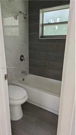 a bathroom with a window