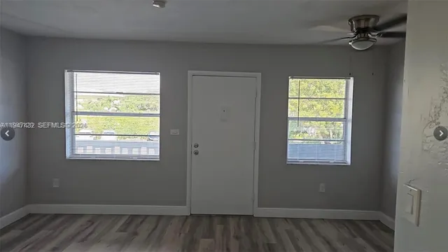 a view of a room that has a window in it