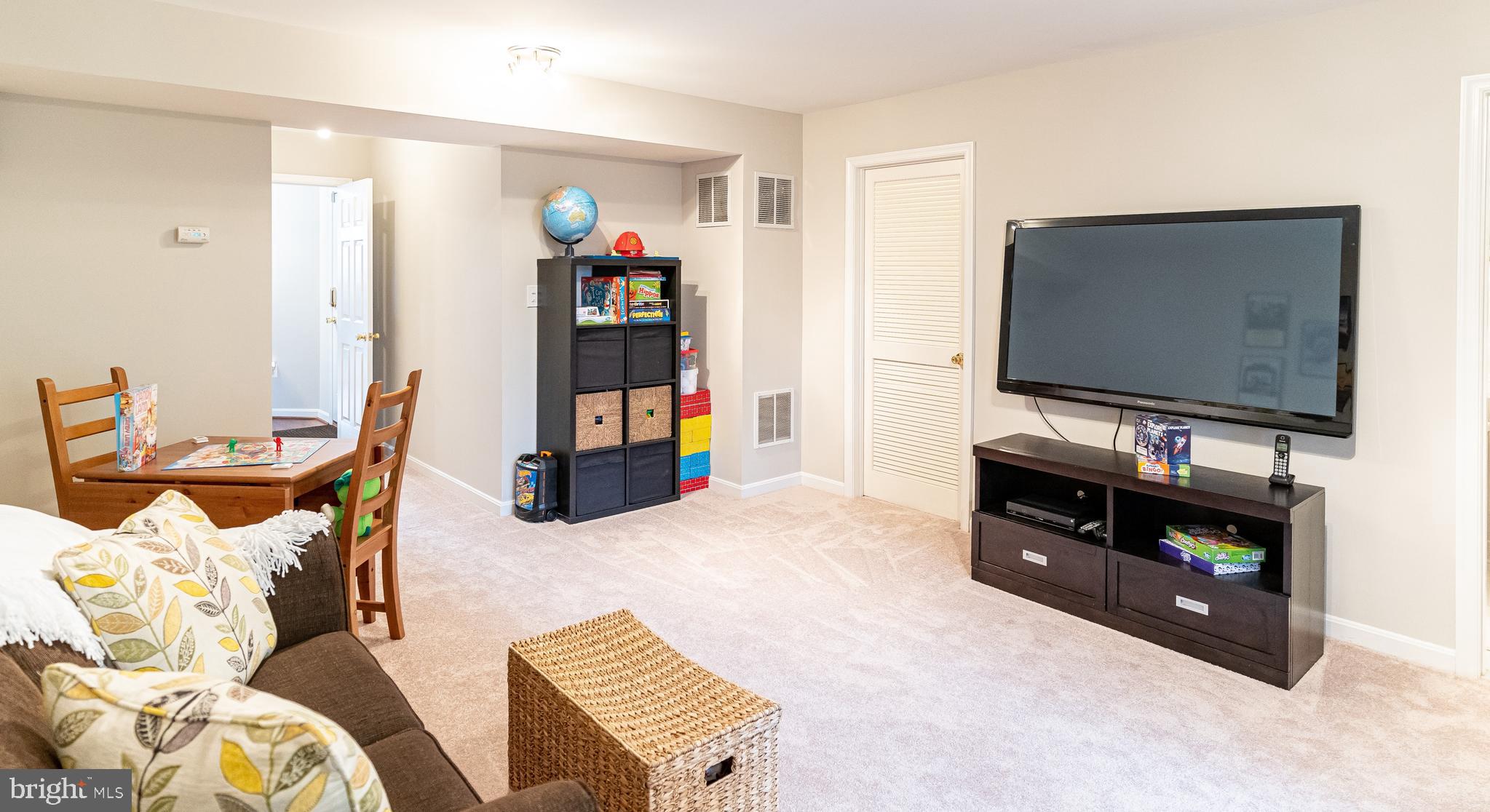 11004 Hemingway Court Silver Spring, MD 20902 - Photo 19 of 23 Rec Room/Bedroom #4 w/Access to Garage + Laundry