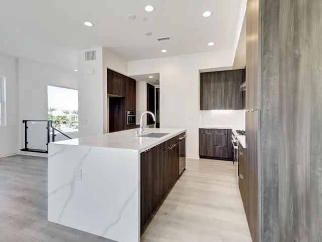 a kitchen with a stove and a cabinet