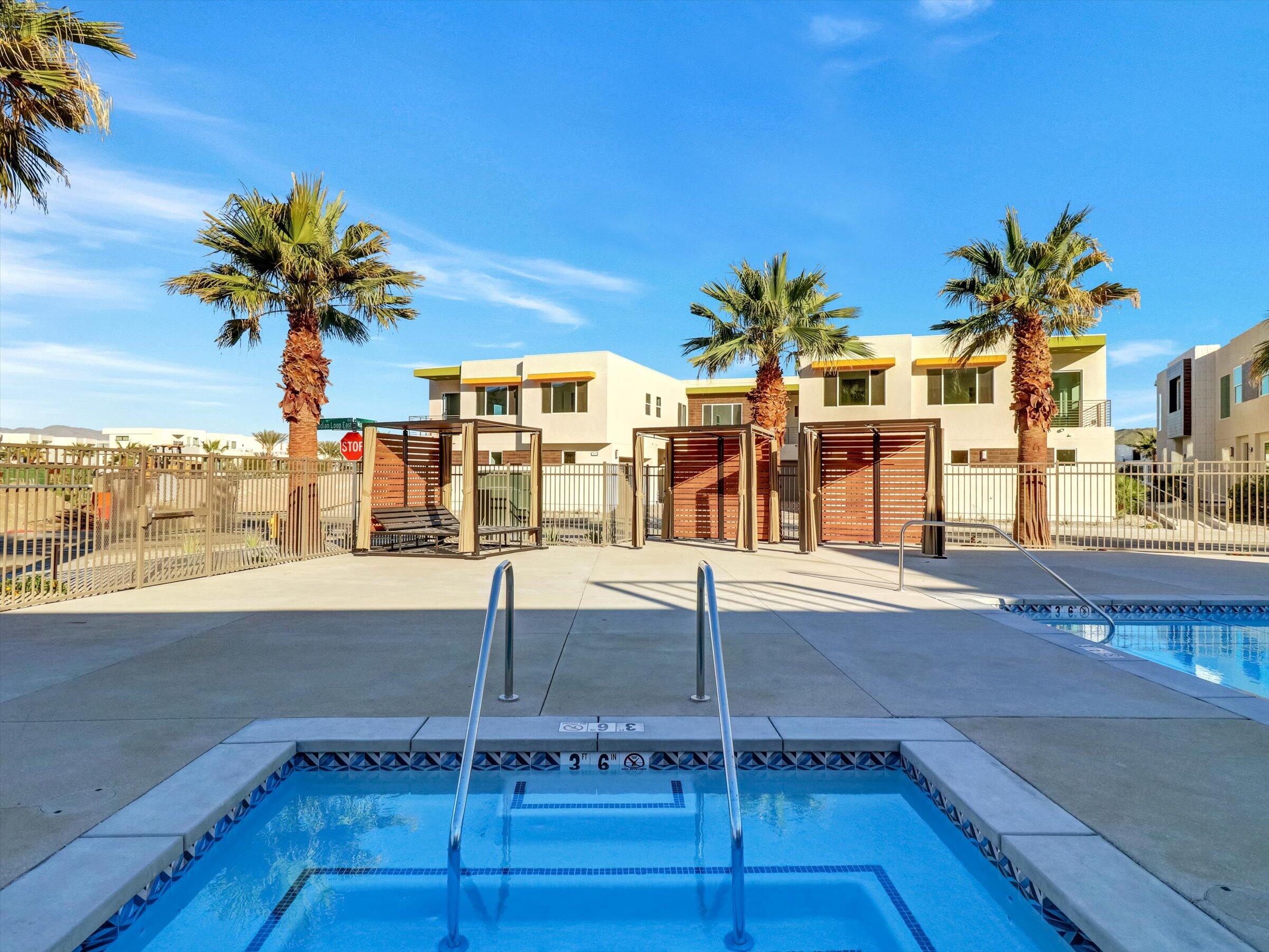 718 Obsidian Loop East, Unit 73 Palm Springs, CA 92264 - Photo 37 of 49 a view of a terrace with seating space