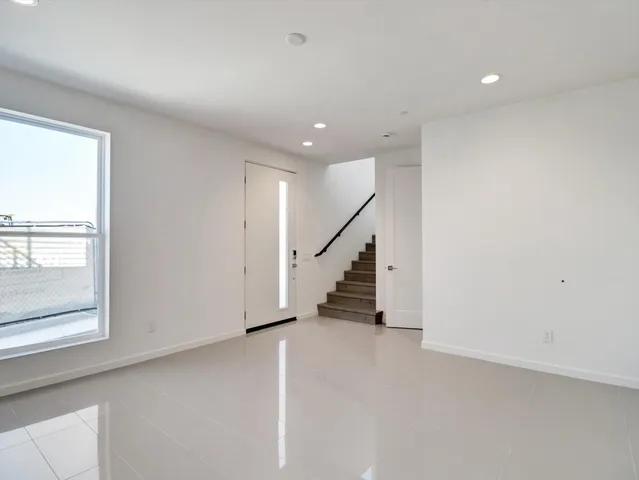 a view of an entryway with stairs