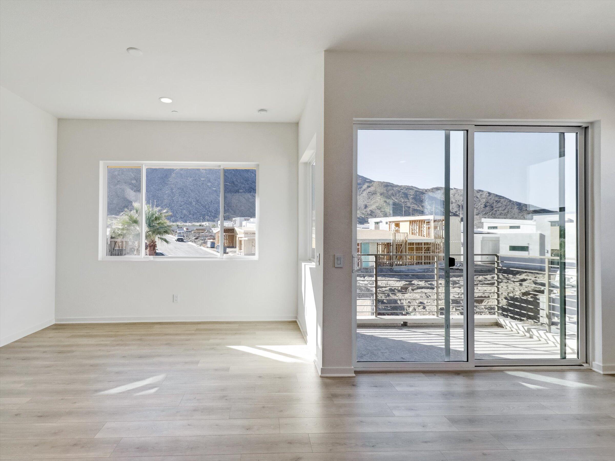 718 Obsidian Loop East, Unit 73 Palm Springs, CA 92264 - Photo 10 of 49 a view of a living room and window