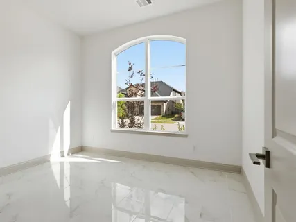 an empty room with windows