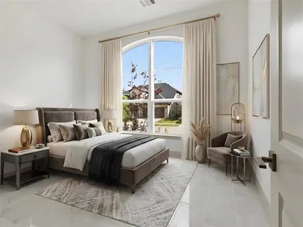 a bedroom with a bed and a potted plant