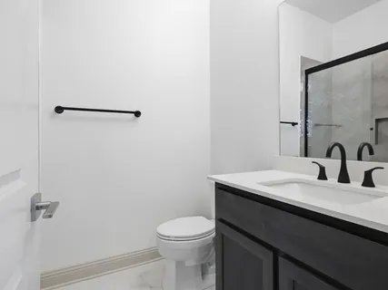 a view of house with backyard porch and outdoor seating