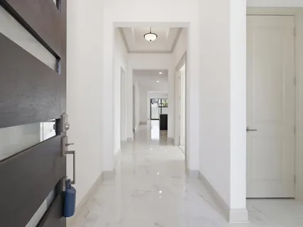 a aerial view of a house with a yard