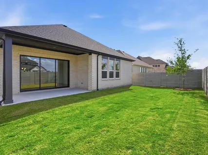an aerial view of a city with lots of residential buildings
