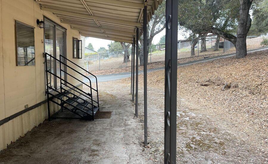 17653 Vierra Canyon Road Salinas, CA 93907 - Photo 15 of 100 a view of a porch with a yard