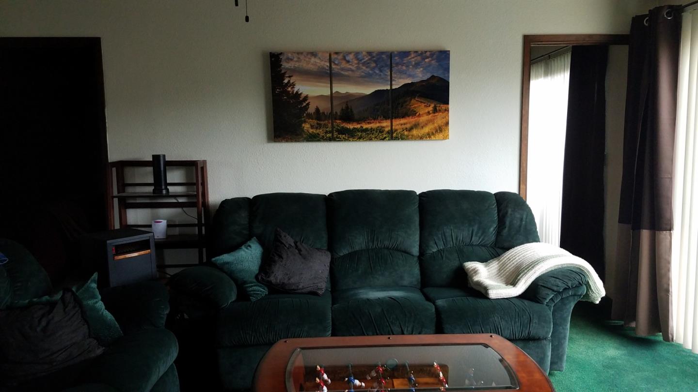 17653 Vierra Canyon Road Salinas, CA 93907 - Photo 34 of 100 a living room with furniture and a rug