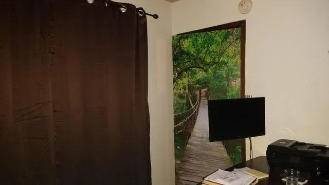 a view of an empty room and window