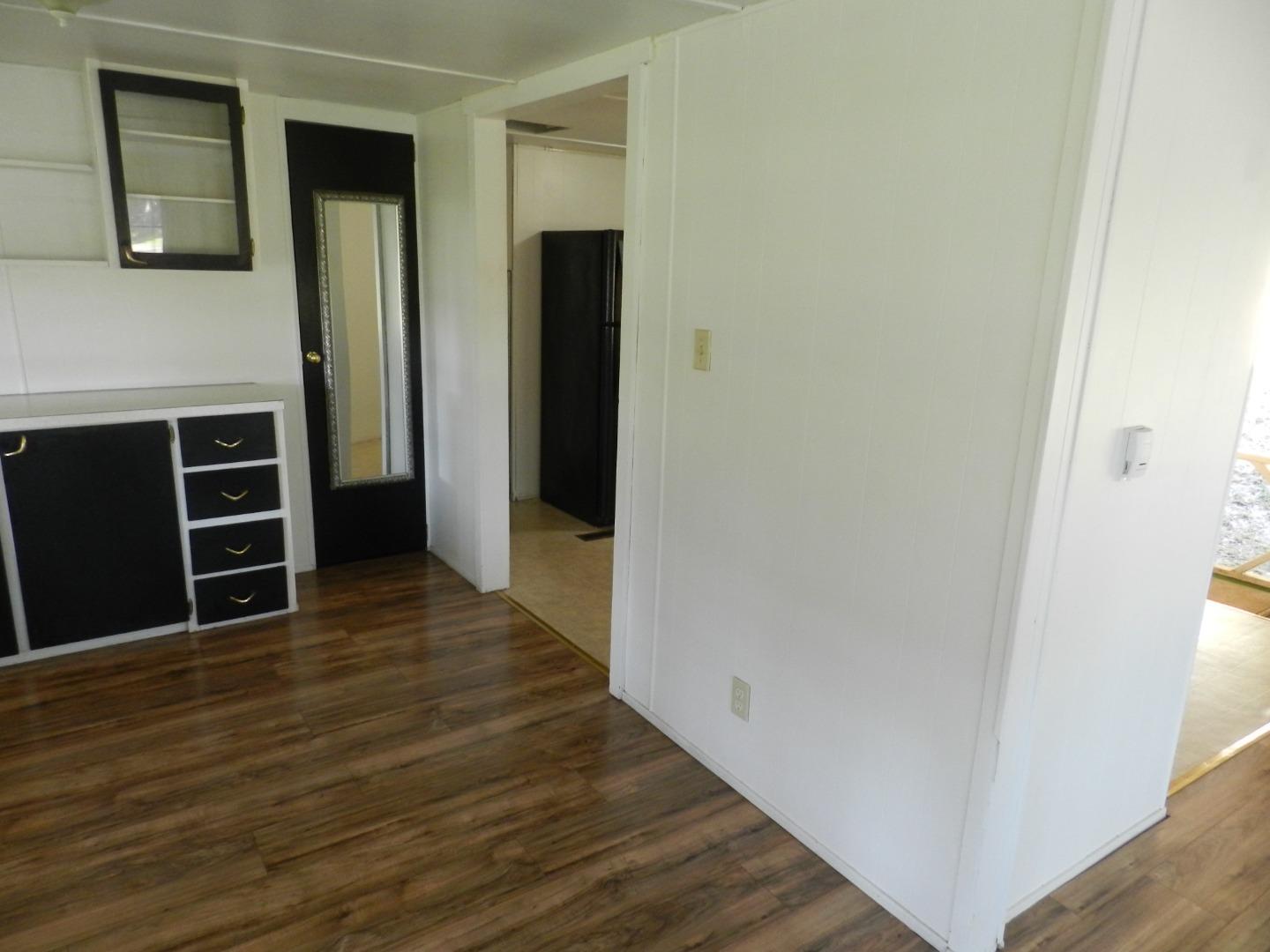 17653 Vierra Canyon Road Salinas, CA 93907 - Photo 81 of 100 a view of a bedroom with wooden floor and closet