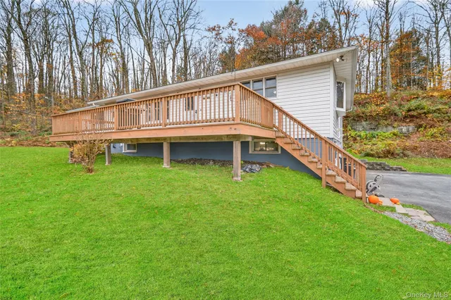 a balcony with trees in front of it