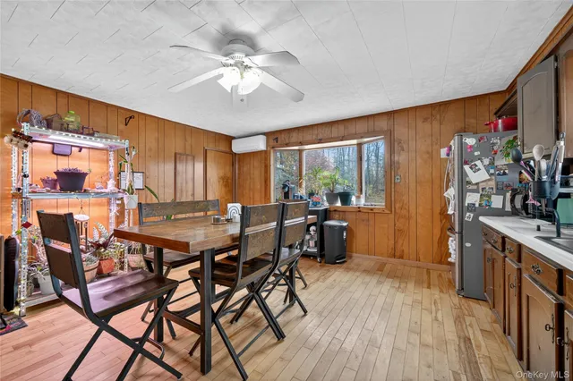 a bathroom with a sink a vanity and a mirror