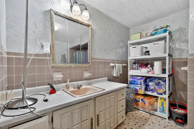 a bathroom with a sink and a toilet