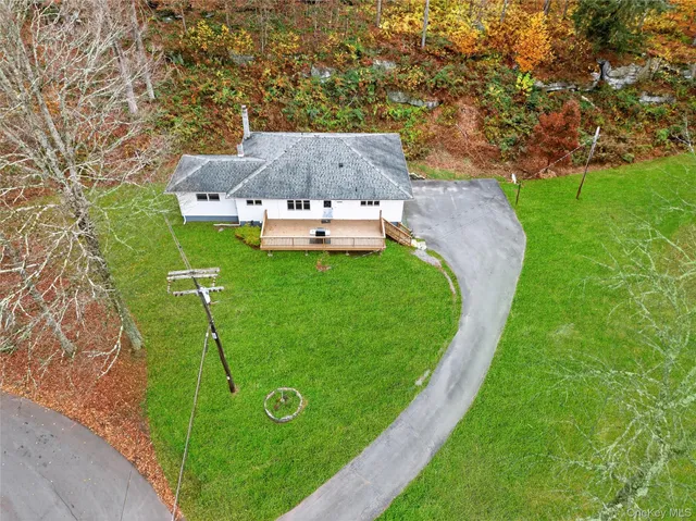 a view of house with garden