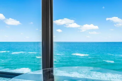 a view of an ocean from a room