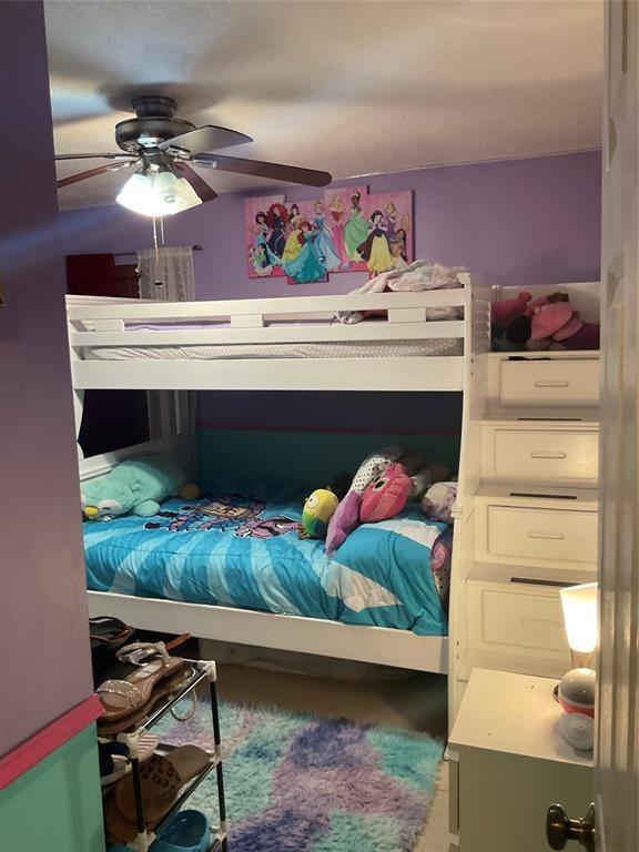 4770 Northwest 85th Avenue Lauderhill, FL 33351 - Photo 31 of 44 a bed room with a bed and a fireplace