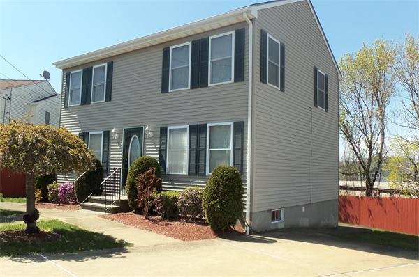 45 Beach Fall River Ma Fall River, MA 02721 - Photo 1 of 18 a front view of a house with a yard