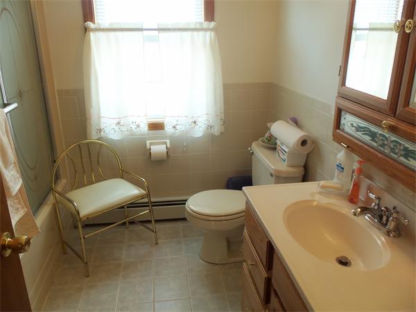 45 Beach Fall River Ma Fall River, MA 02721 - Photo 9 of 18 a bathroom with a sink mirror bathtub and toilet