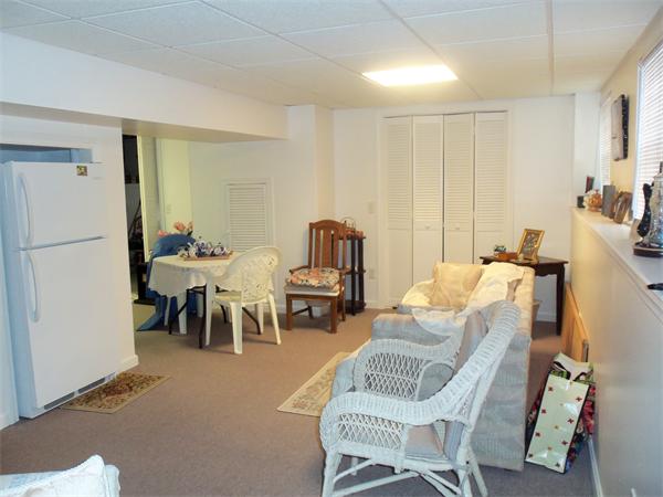 45 Beach Fall River Ma Fall River, MA 02721 - Photo 10 of 18 a living room with furniture and a large window