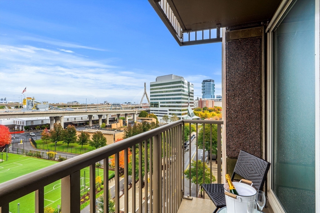 10 Museum Way, Unit 828 Cambridge, MA 02141 - Photo 15 of 36 a view of a balcony next to a roof deck