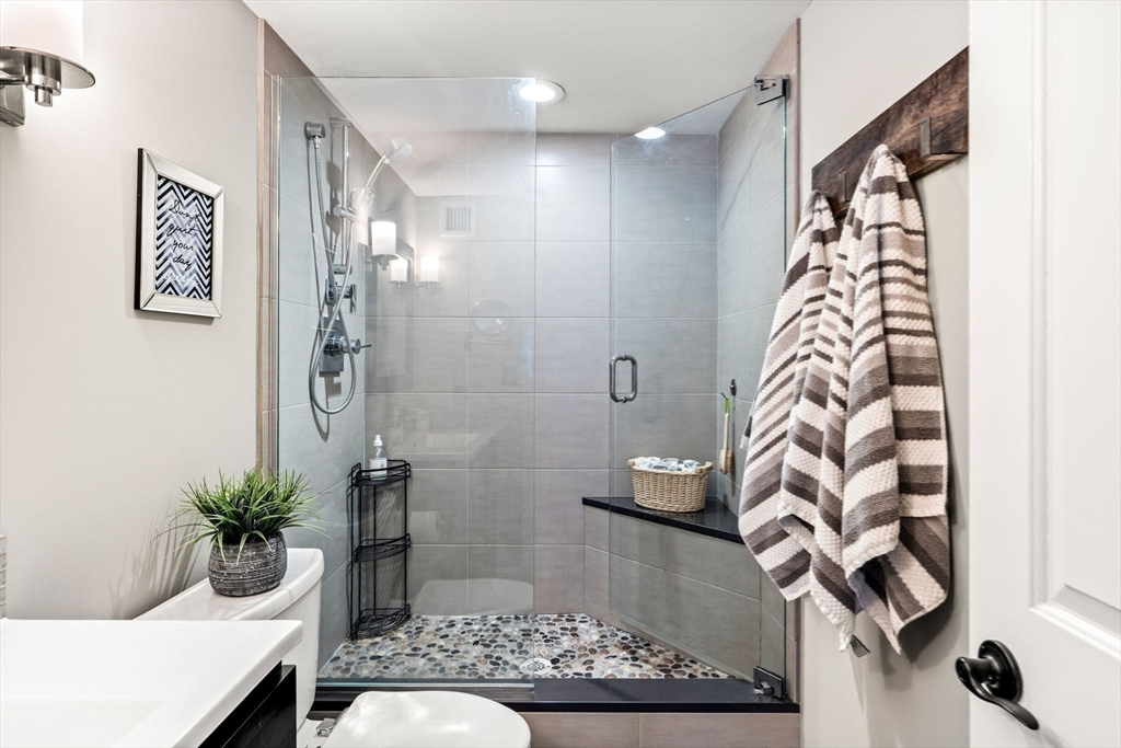 10 Museum Way, Unit 828 Cambridge, MA 02141 - Photo 17 of 36 a bathroom with a bathtub and shower