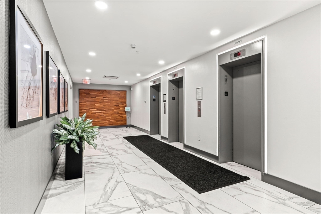 10 Museum Way, Unit 828 Cambridge, MA 02141 - Photo 27 of 36 a view of entryway with flower pots