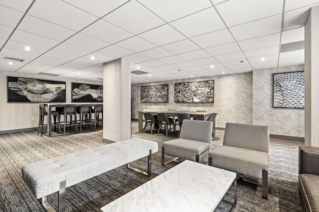 10 Museum Way, Unit 828 Cambridge, MA 02141 - Photo 34 of 36 a living room with furniture and a table