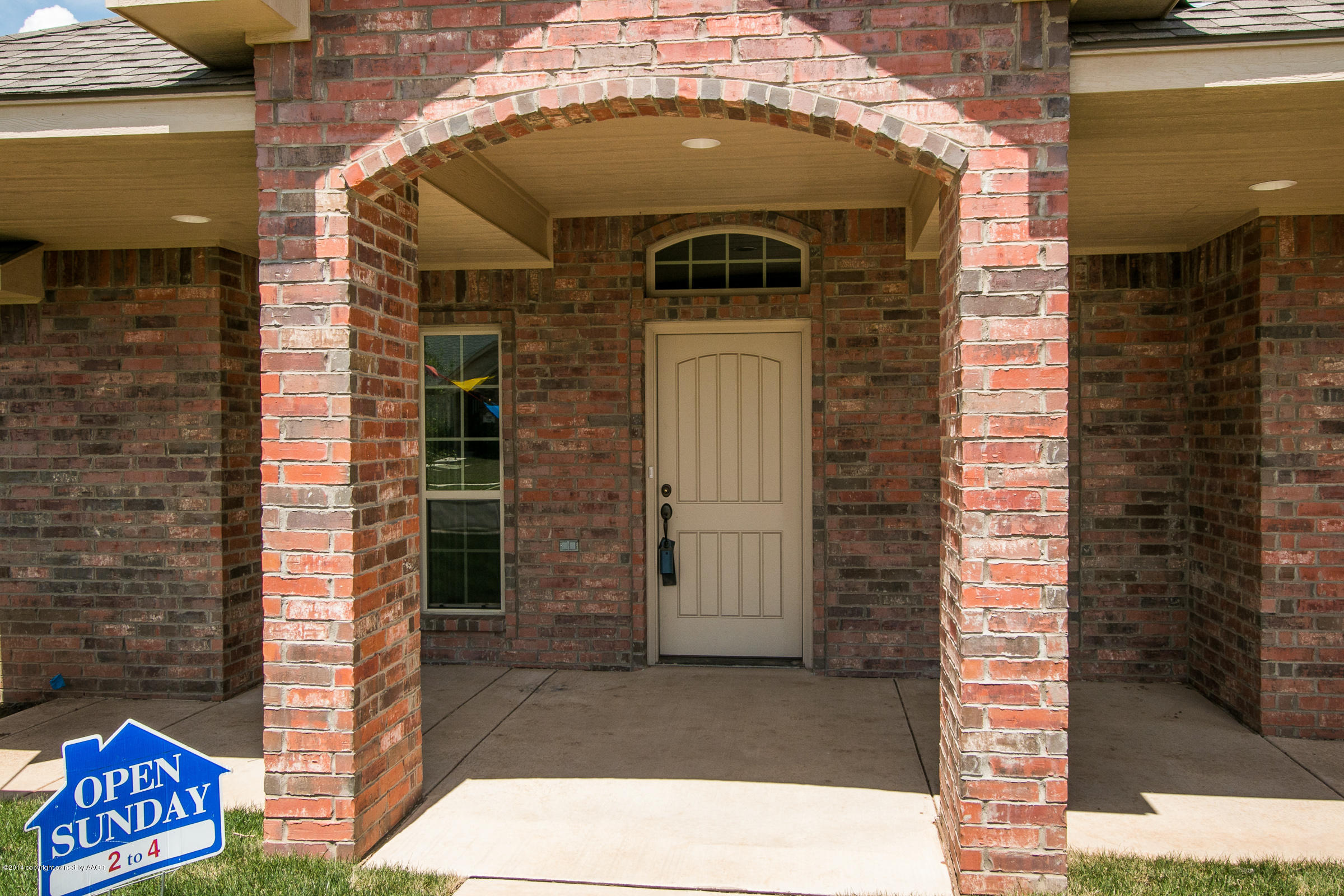 3906 Arden Road Amarillo, TX 79118 - Photo 2 of 22 a couple of potted plants in front of door