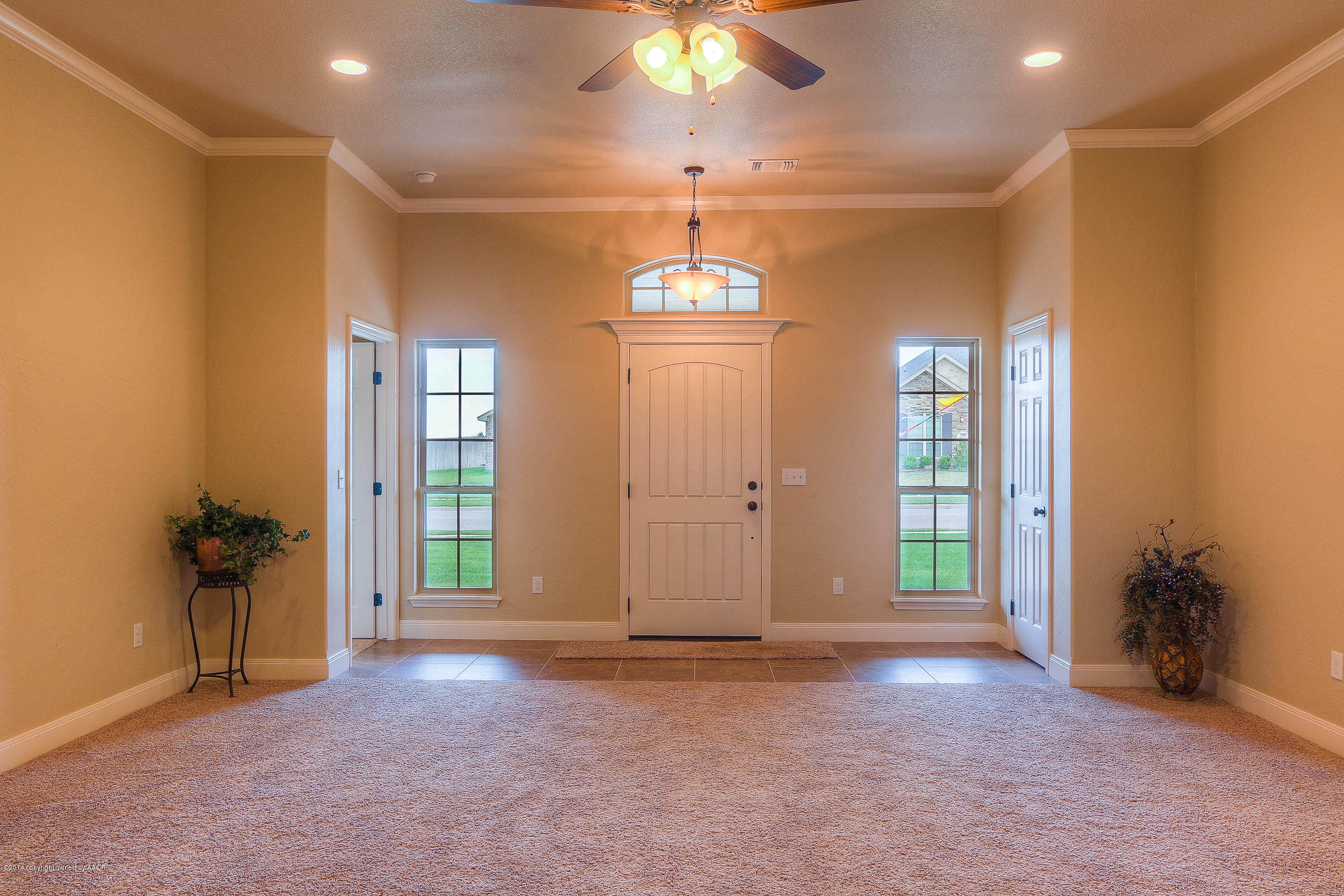 3906 Arden Road Amarillo, TX 79118 - Photo 4 of 22 a view of an empty room with a window
