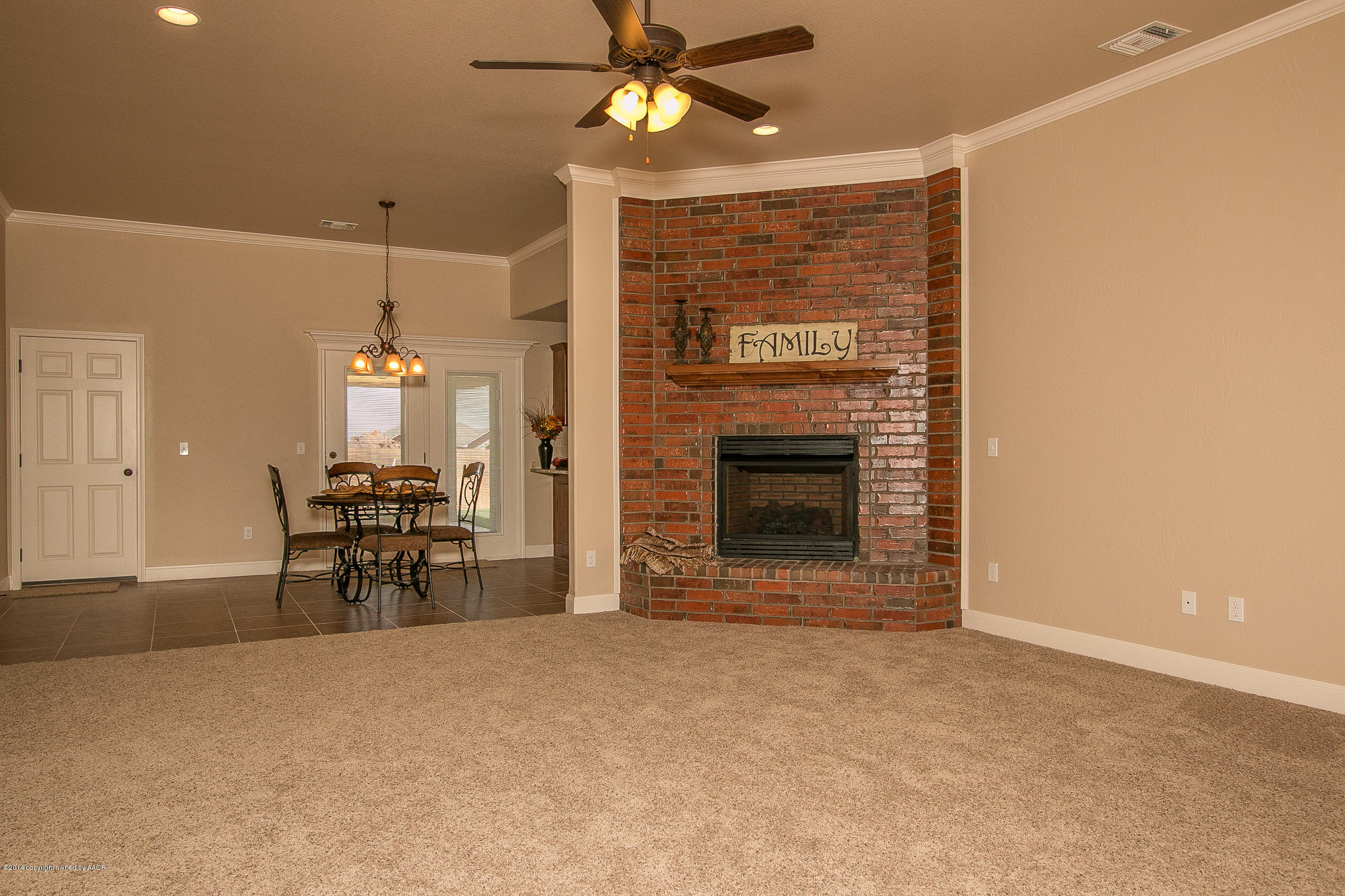 3906 Arden Road Amarillo, TX 79118 - Photo 5 of 22 a view of livingroom with furniture and chandelier fan