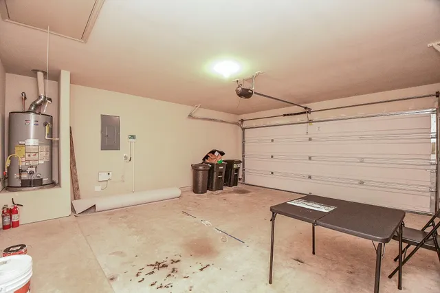 a view of a backyard with a garden and plants