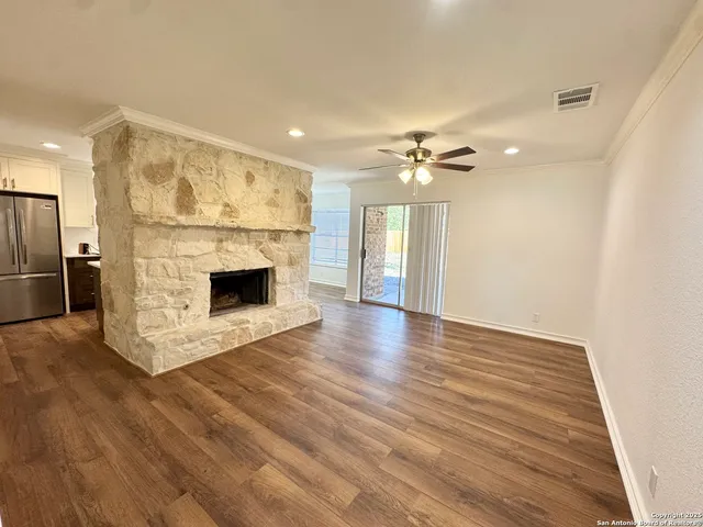 a view of a livingroom with a fireplace