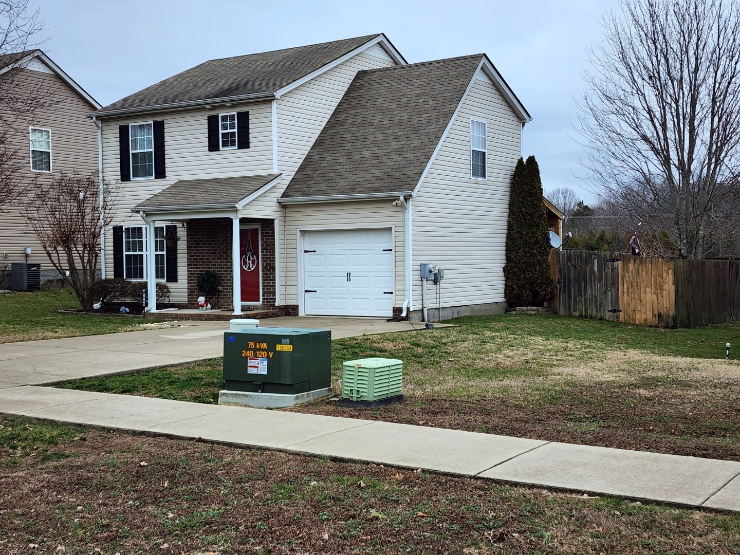 1049 Woodall Road Lebanon, TN 37090 - Photo 2 of 41 a front view of a house with a garden