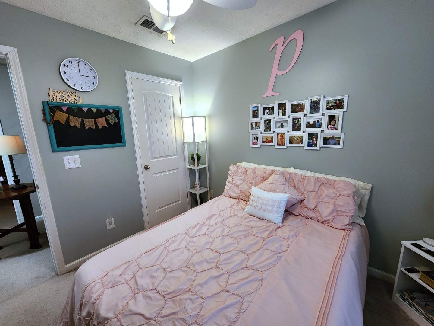 1049 Woodall Road Lebanon, TN 37090 - Photo 29 of 41 a bedroom with a bed and a chandelier