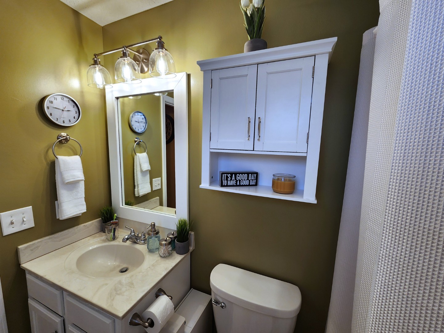 1049 Woodall Road Lebanon, TN 37090 - Photo 31 of 41 a bathroom with a granite countertop toilet sink and mirror